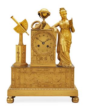 A French Empire early 19th century gilt bronze mantel clock.