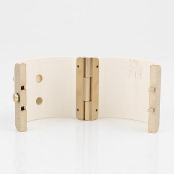 Chanel, a white acrylic bracelet with pearls, 2019.