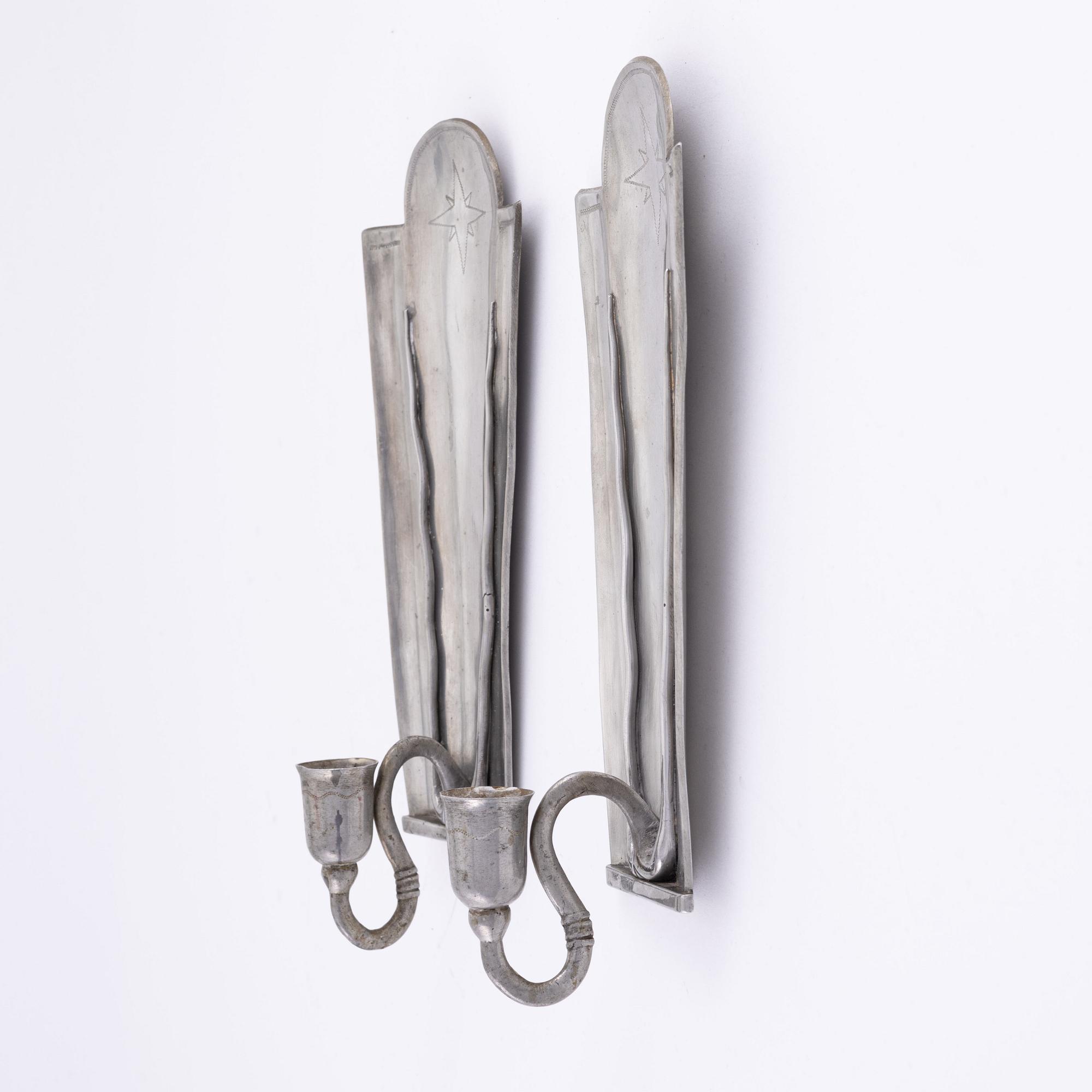 A pair of pewter wall sconces, Taidetakomo Antti Hakkarainen, Finland, 1930-tal.