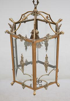 TAKLYKTA, mässing, 1900-talets första hälft. Höjd ca 70 cm.
