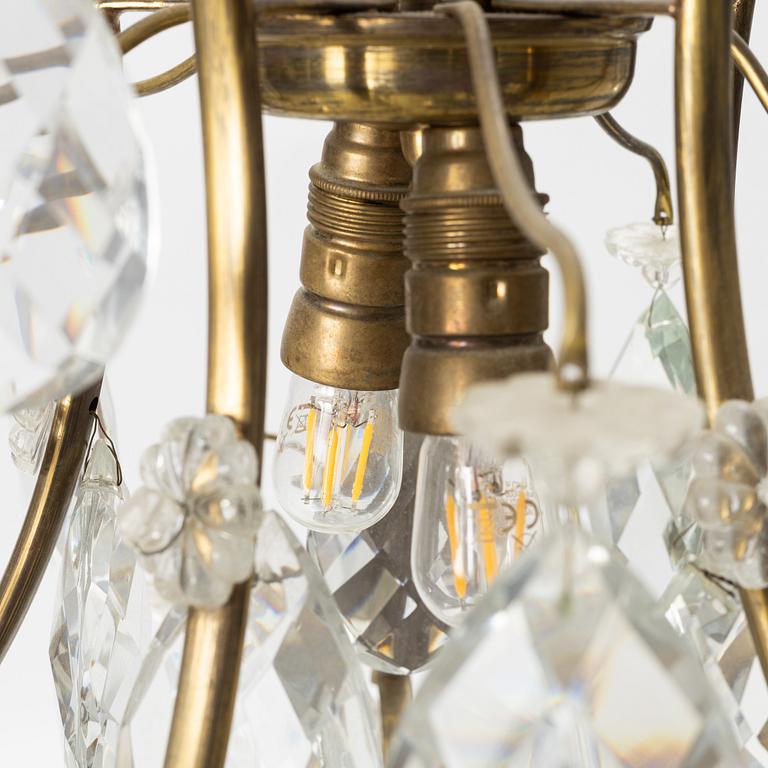 Takkrona, barockstil, 1900-talets första hälft.