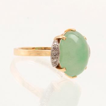 Börje Löfgren, ring in 18K white and red gold with an oval cabochon-cut jadeite and single-cut diamonds, Stockholm 1964.