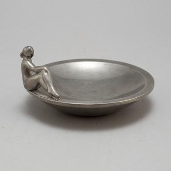 a pewter plate by Firma Svenskt Tenn Stockholm, 1928.
