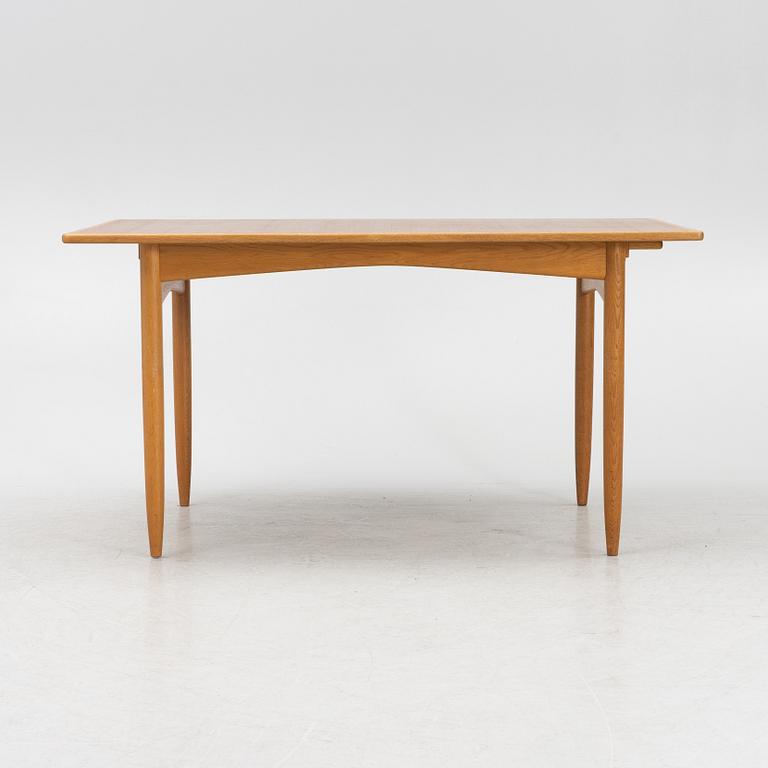 A teak and oak dining table, Scandinavia, 1960's.