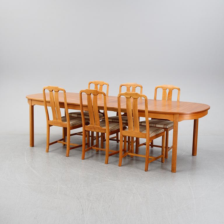 Carl Malmsten, a 'Ambassdör' walnut dining suite, Åfors Möbelfabrik.