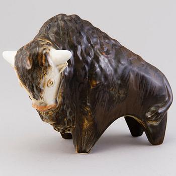 A Ceramic Figurine, signed T Kaasinen Arabia Finland.