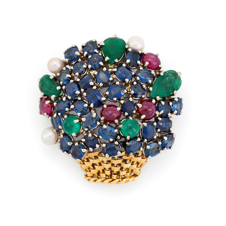 An 18K gold Carlman brooch set with sapphires, emeralds, rubies and pearls.