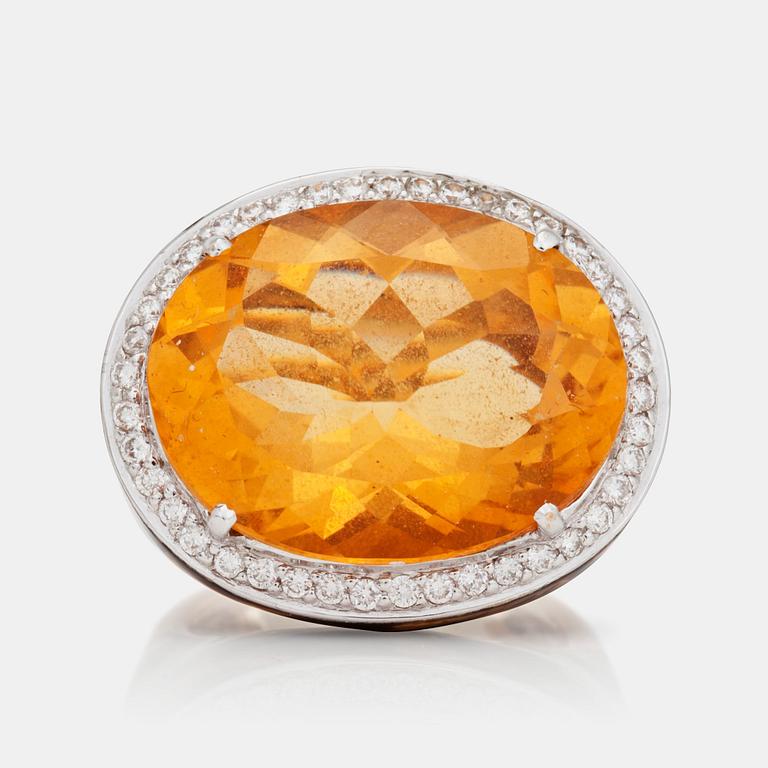 A citrine, brilliant-cut diamond and laquer ring. The laquer in leopard pattern. Total gem-weight diamonds circa 0.42ct.