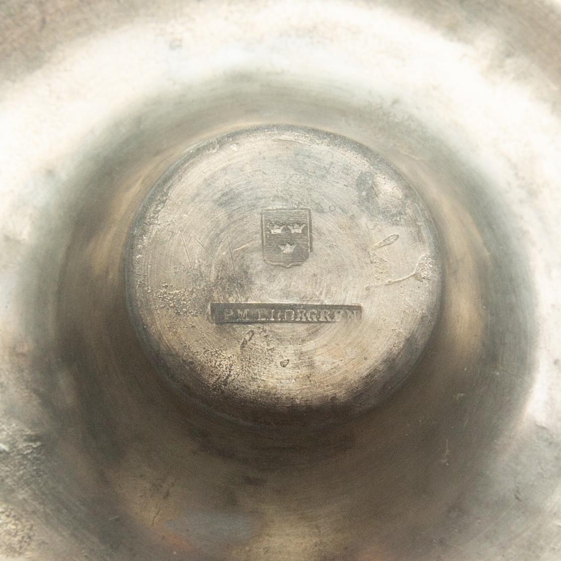 Candle holders, two pieces of pewter, 1850s.