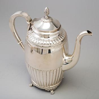 A 3 part silver coffee service dated 1919.