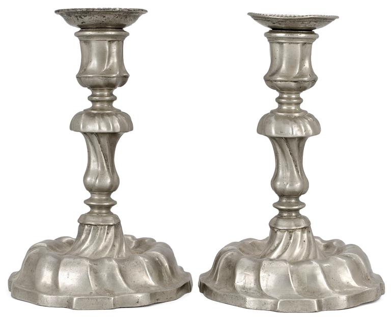 A pair of Rococo pewter candlesticks by N. Lake, Vänersborg 1756.