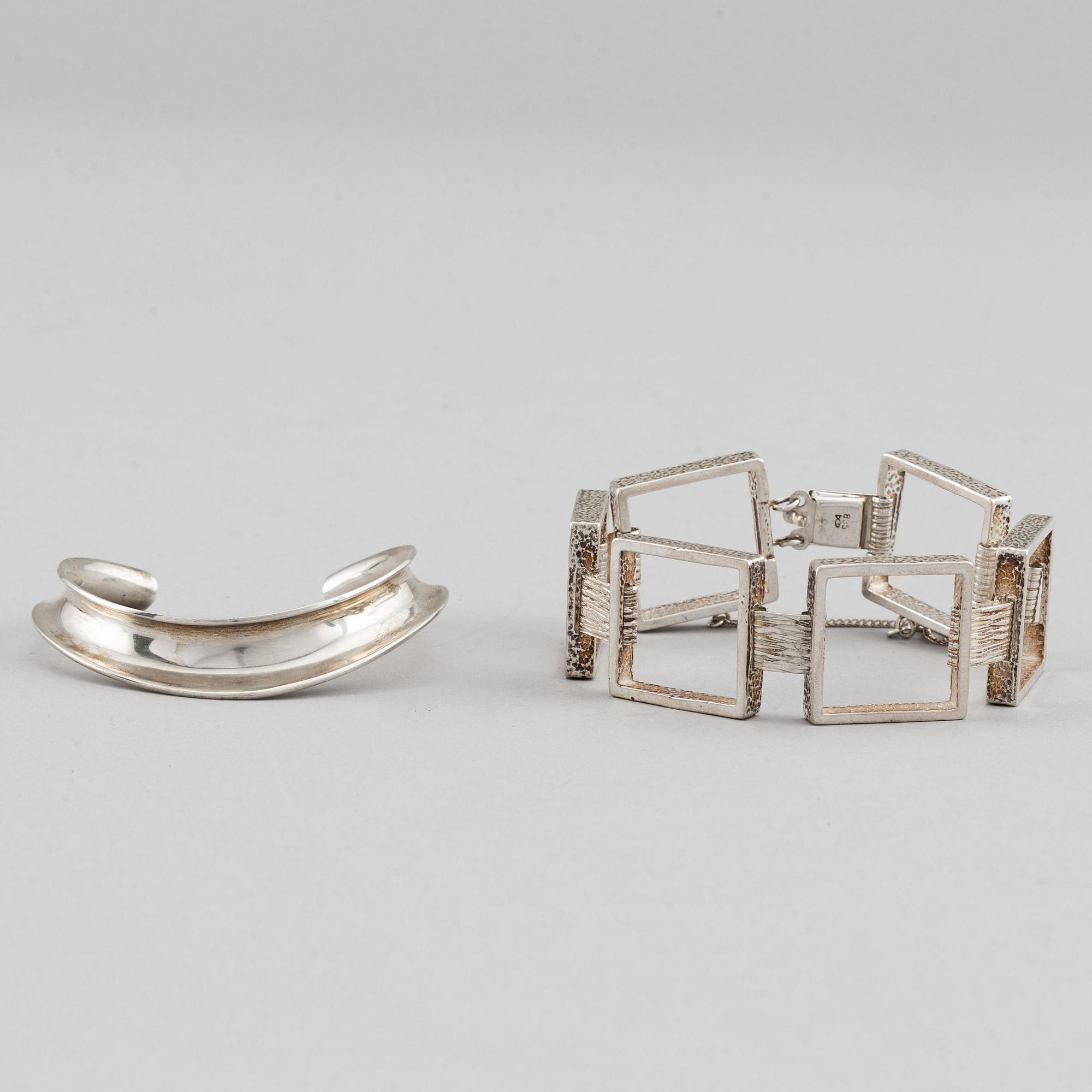 Two silver bracelets, including Denmark.
