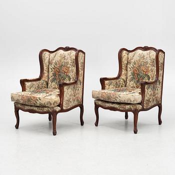 A pair of Louis XV-style armchairs, mid 20th Century.