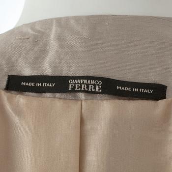 GIANFRANCO FERRÉ, a beige three-piece ensemble consisting of vest , trousers and skirt.