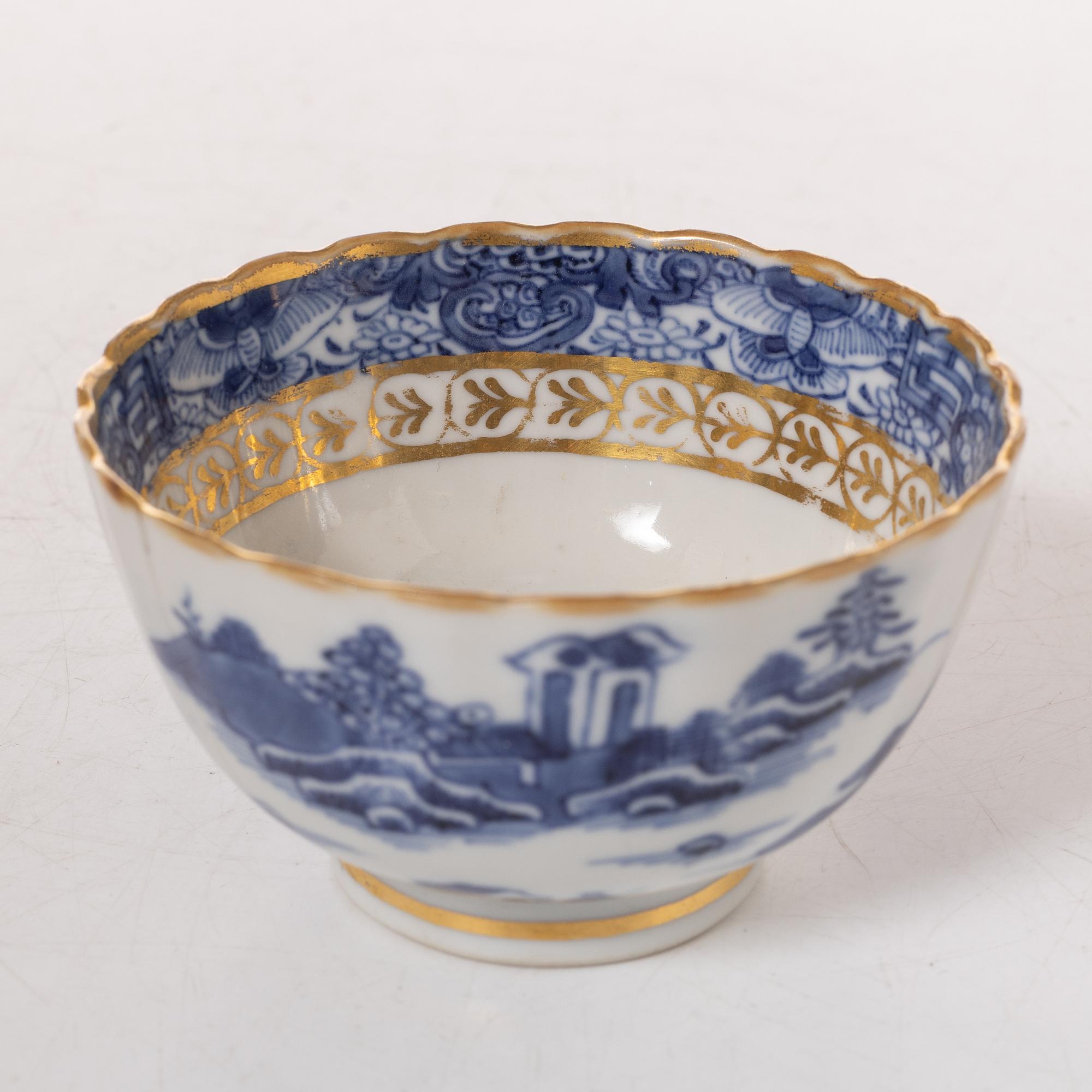 A group  of three serving dishes, a serving bowl, a cup, and seven plates, porcelain, including China 18th century.