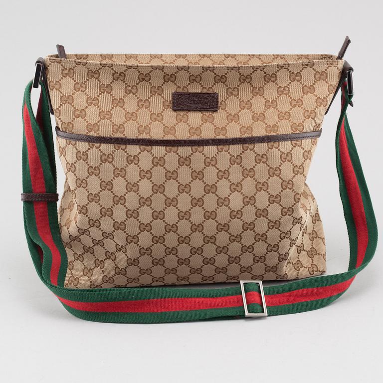 GUCCI, a "Messenger" bag.