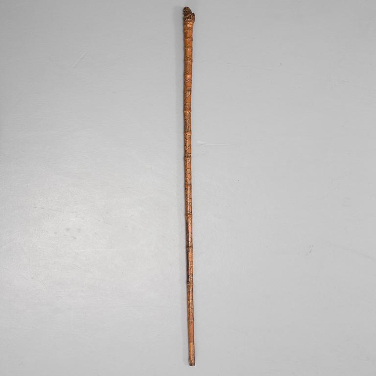A CHINESE BAMBOO WALKING STICK, latter part of the 19th century.