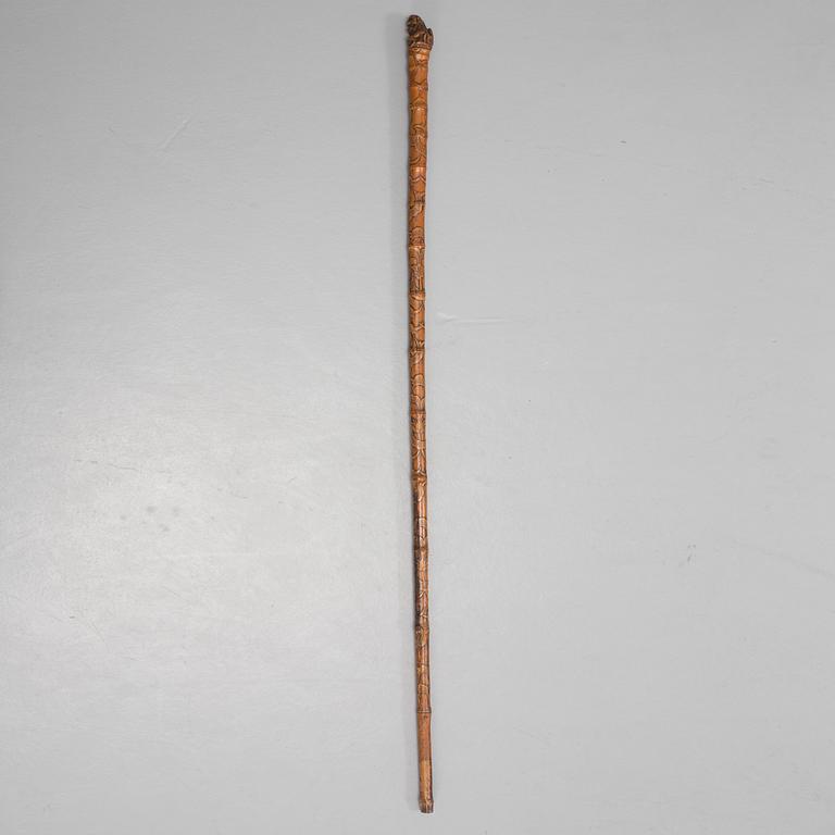 A CHINESE BAMBOO WALKING STICK, latter part of the 19th century.