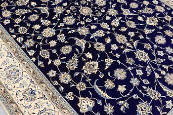 A carpet, Nain part silk, 350 x 250 cm.