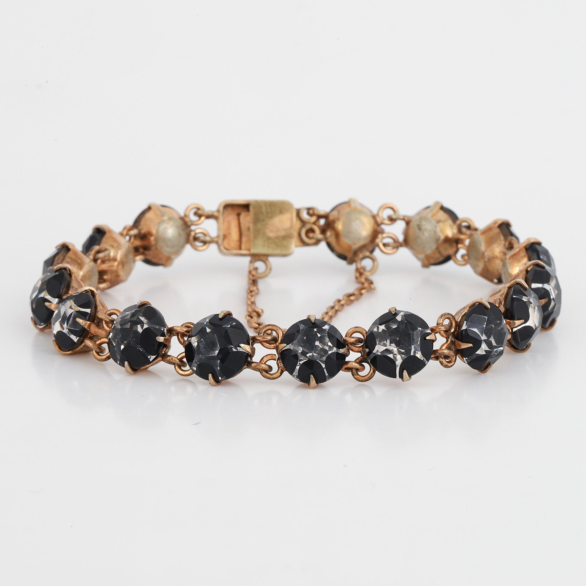 ARMBAND, silver  med färglösa stenar och svart lack.