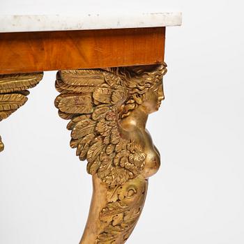 A presumably Austrian Empire centre table, early 19th century.