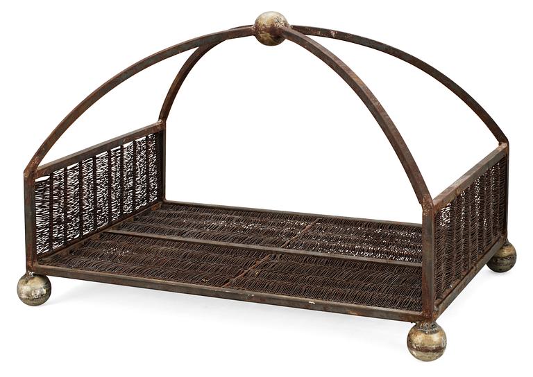 A 20th cent iron wood-basket.