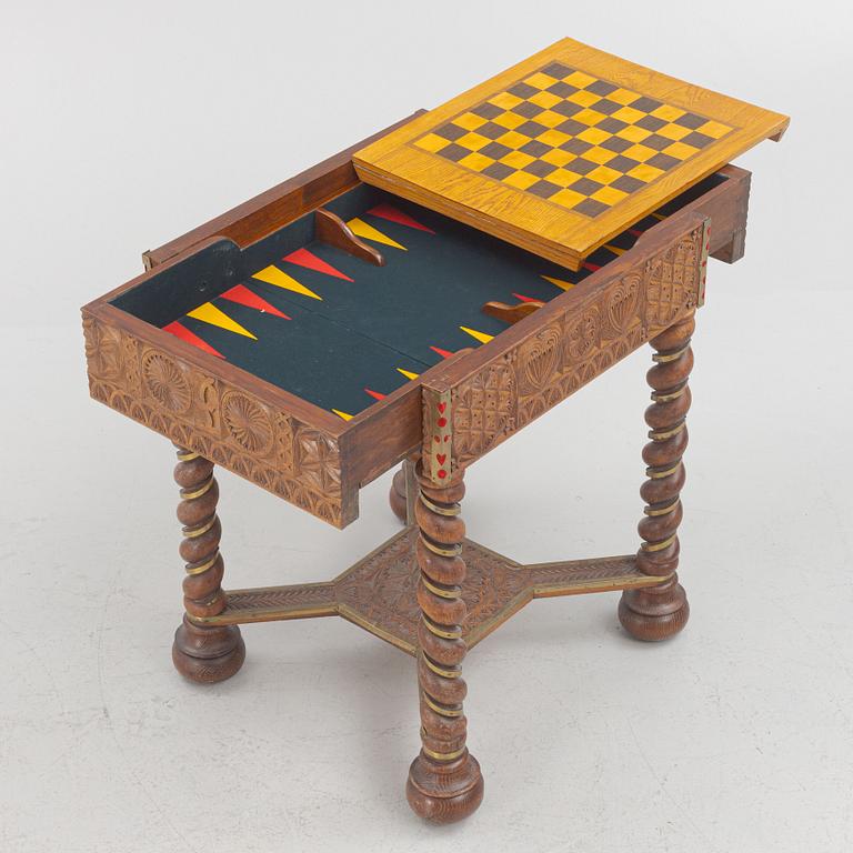 A Baroque style table with boardgames. 1900-tal.