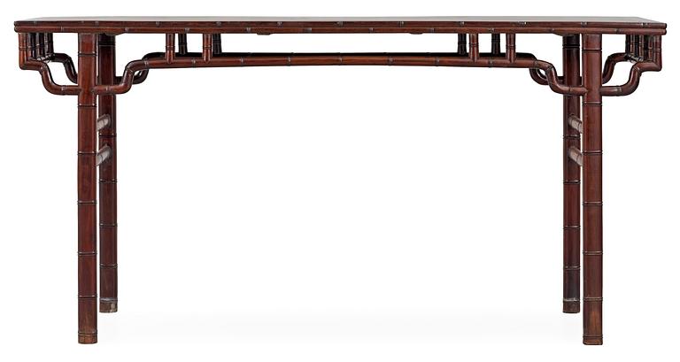 A hardwood free standing table, Qing dynasty.