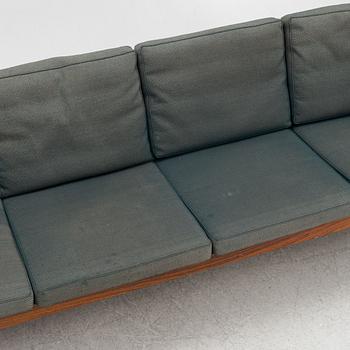 Hans J. Wegner, a model AP62/4 sofa and model AP62/1 armchiar,