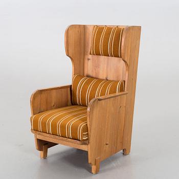 Axel Einar Hjorth, a "Lovö" stained pine armchair, Nordiska Kompaniet, Sweden, 1930's.