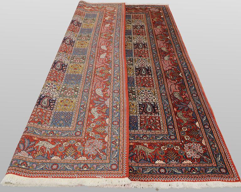A Moud part silk carpet, 298 x 199 cm.