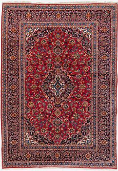 An oriental carpet, c. 340 x 240 cm.