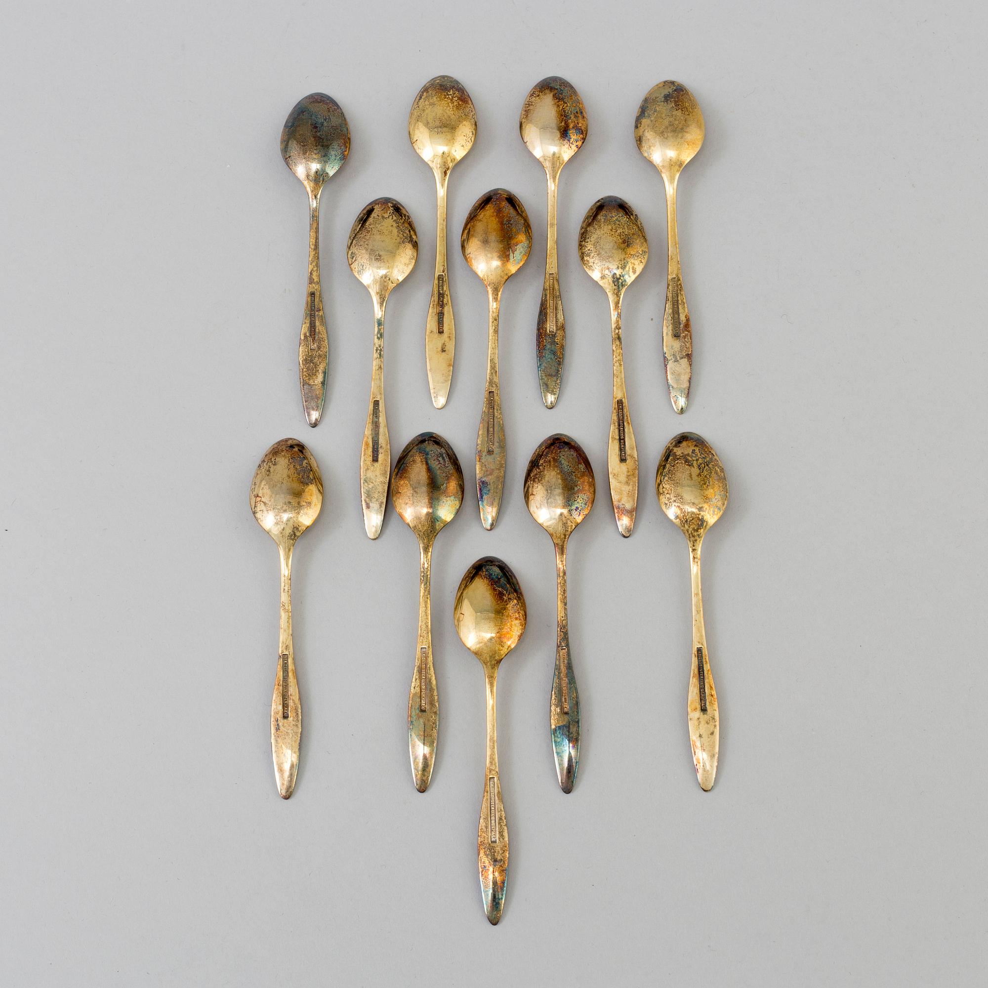 a set of 12 stirling spoons by Frigast, Denmark, 20th century.