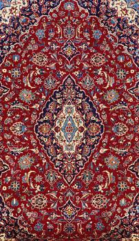 A CARPET KASHAN AROUND 305 X 195 CM.