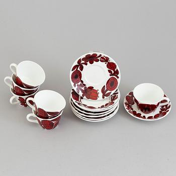 STIG LINDBERG, six bone china 'Röd Aster' coffee cups and saucers from Gustavsberg.