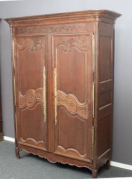 A french carved wooden cabinet, around 1900.