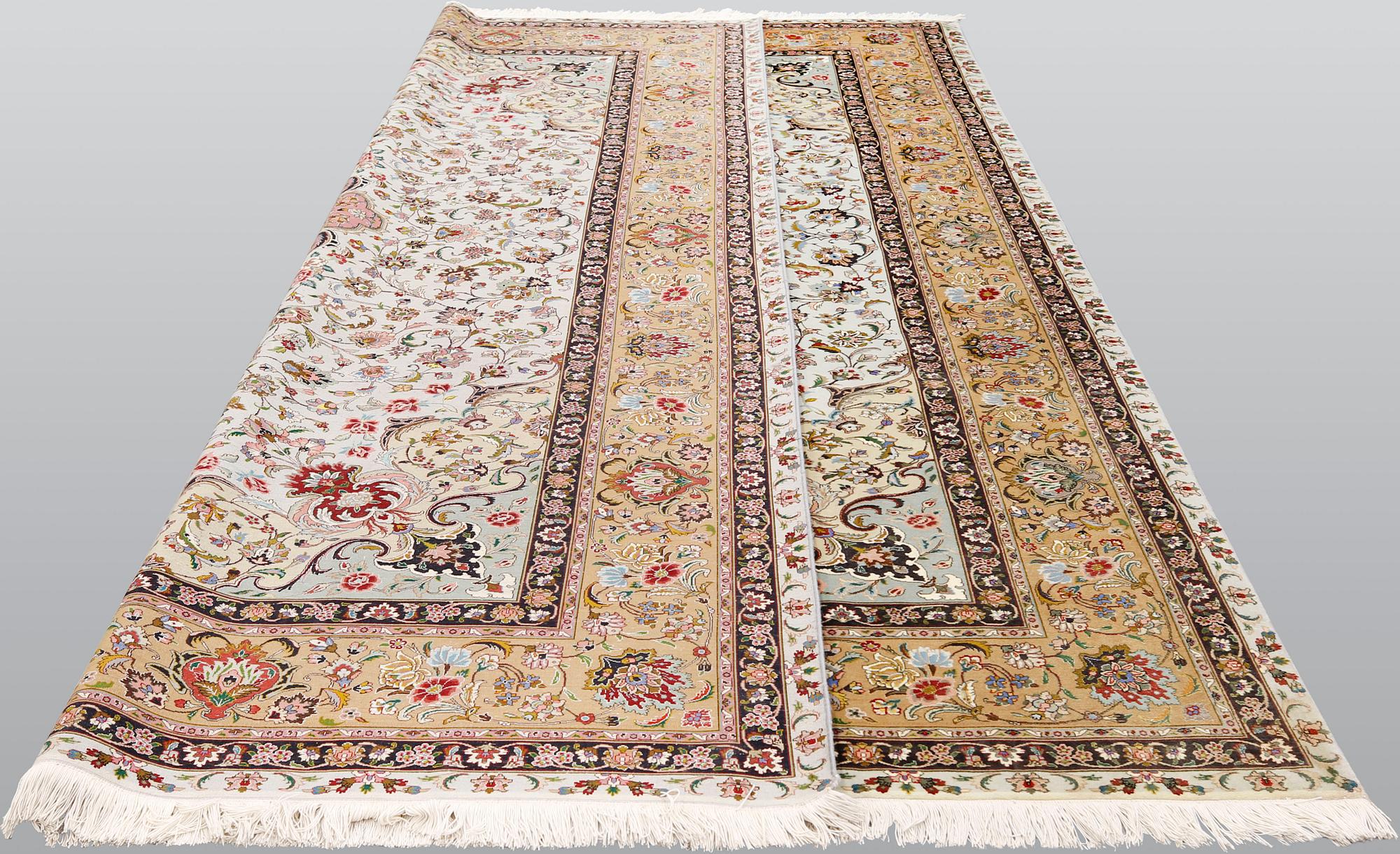 A part silk Tabriz carpet, so-called 50 Raj, approx. 348 x 252 cm.