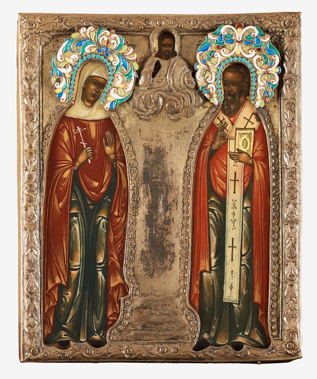 A Russian mid 19th century silver and enamel icon. St. Peter of Murom and St. Fevronie.