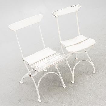 A set of seven garden chairs and two tables Byarums bruk, later part of the 20th century.