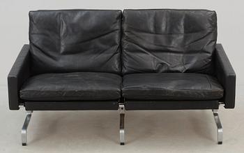 A Poul Kjaerholm 'PK-31-2' black leather and steel sofa, E Kold Christensen, Denmark.