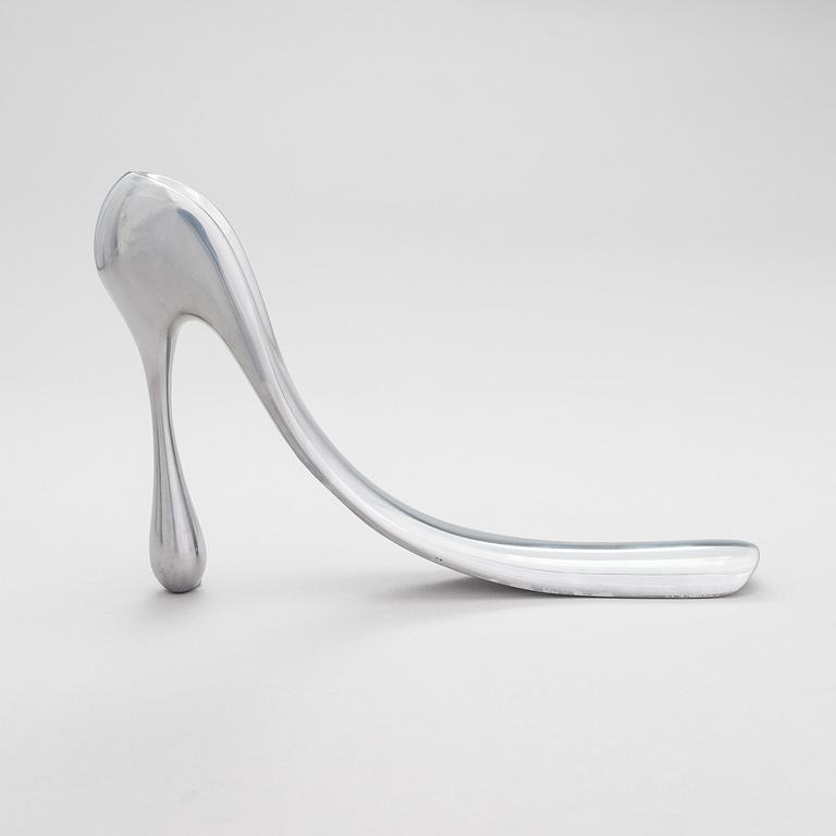 A metal shoe horn by Manolo Blahnik, 2000s.