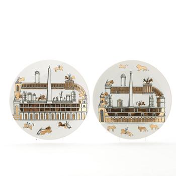 Piero Fornasetti, a set of eleven porcelain plates, Milano, Italy.