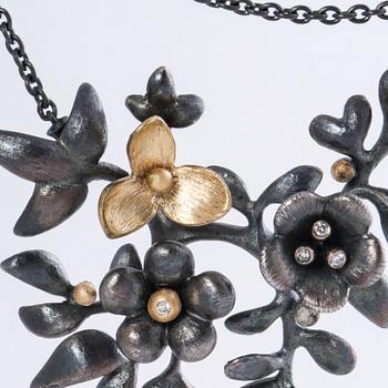 A moonstone and brilliant cut diamond necklace by Ole Lynggaard.