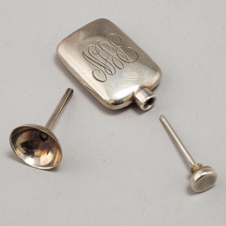 A TIFFANY & CO PERFUME BOTTLE, silver.