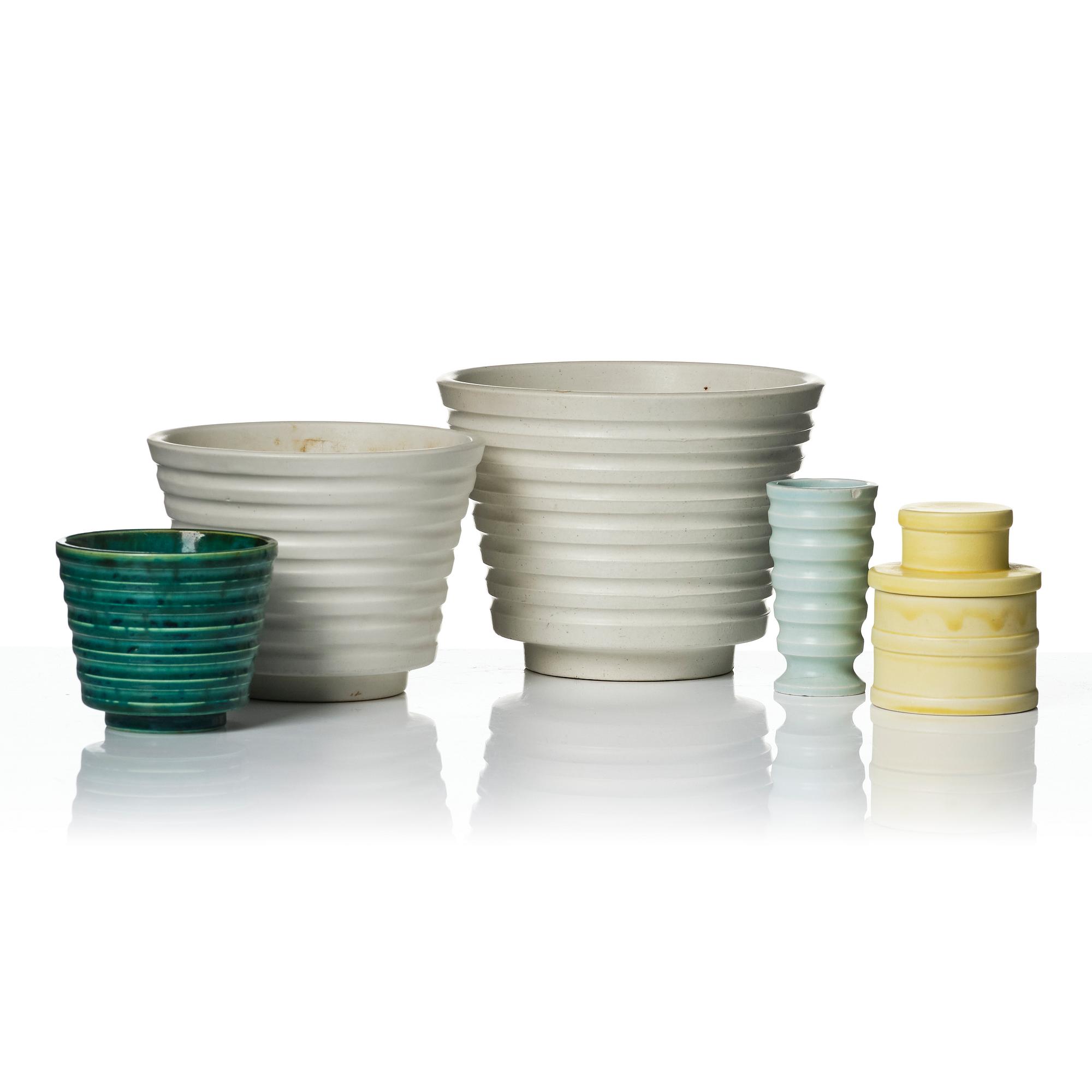 Wilhelm Kåge, A set of three ceramic flower pots, a vase and jar with lid,  Gustavsberg 1930s.