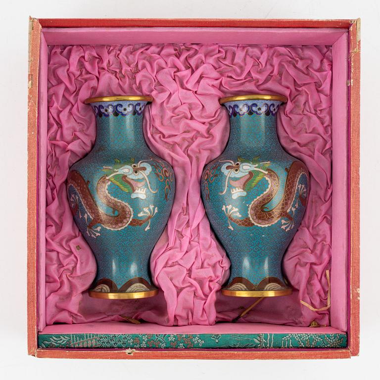 A silk clad box with two cloisonné vases, China early 20th Century.