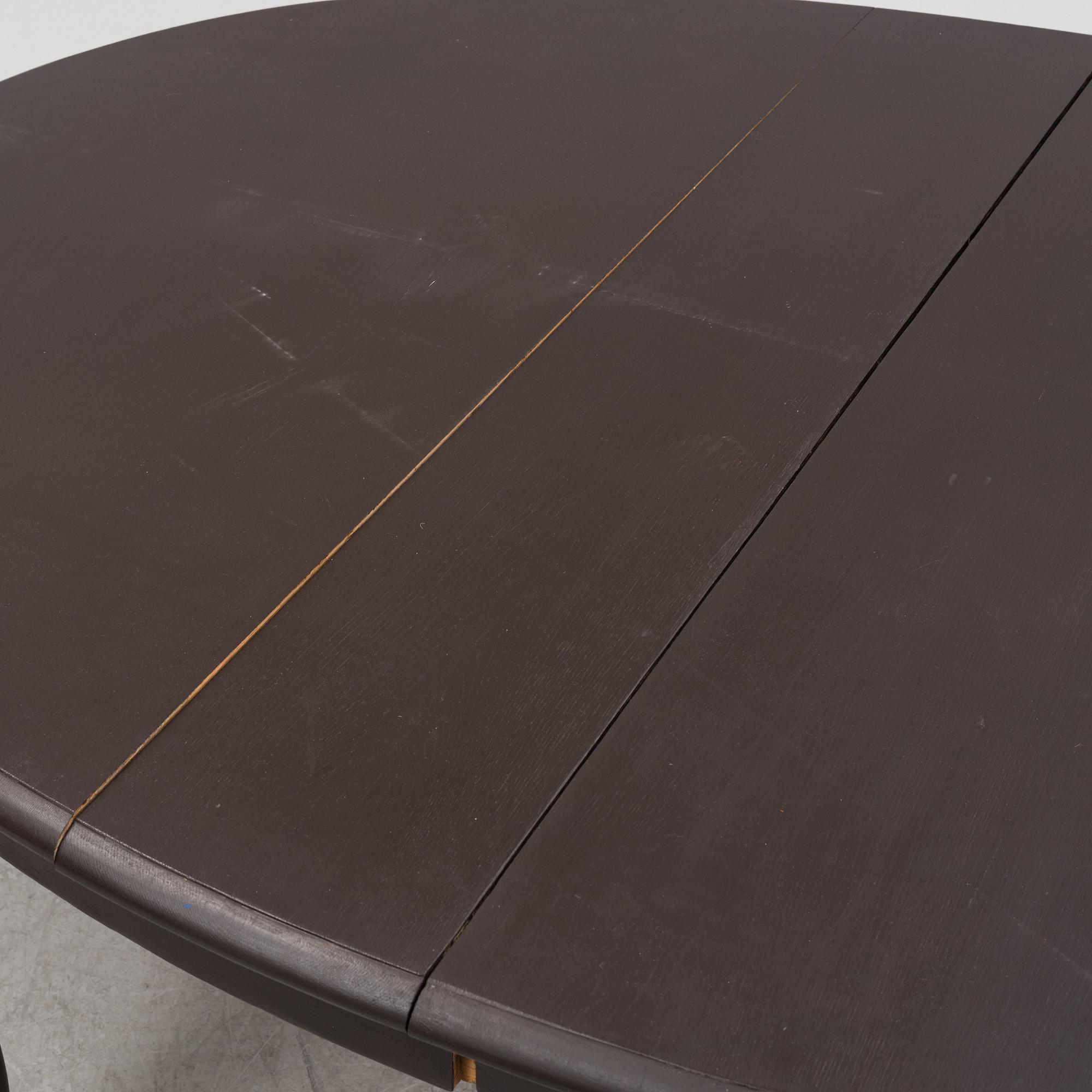 A painted  late Baroque style dining table, early 20th Century.