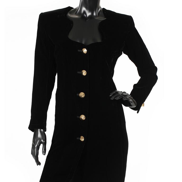 YVES SAINT LAURENT, a black velvet dress.