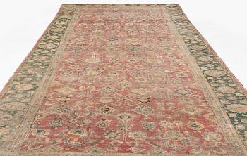 A safavid 'Spiral vine' Esfahan carpet, central persia, mid to second haft of the 17th century. Ca 562 x 231 cm.