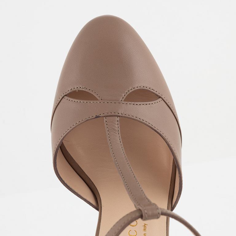 Gucci, a pair of nude leather high heel shoes, 2016, size 37.